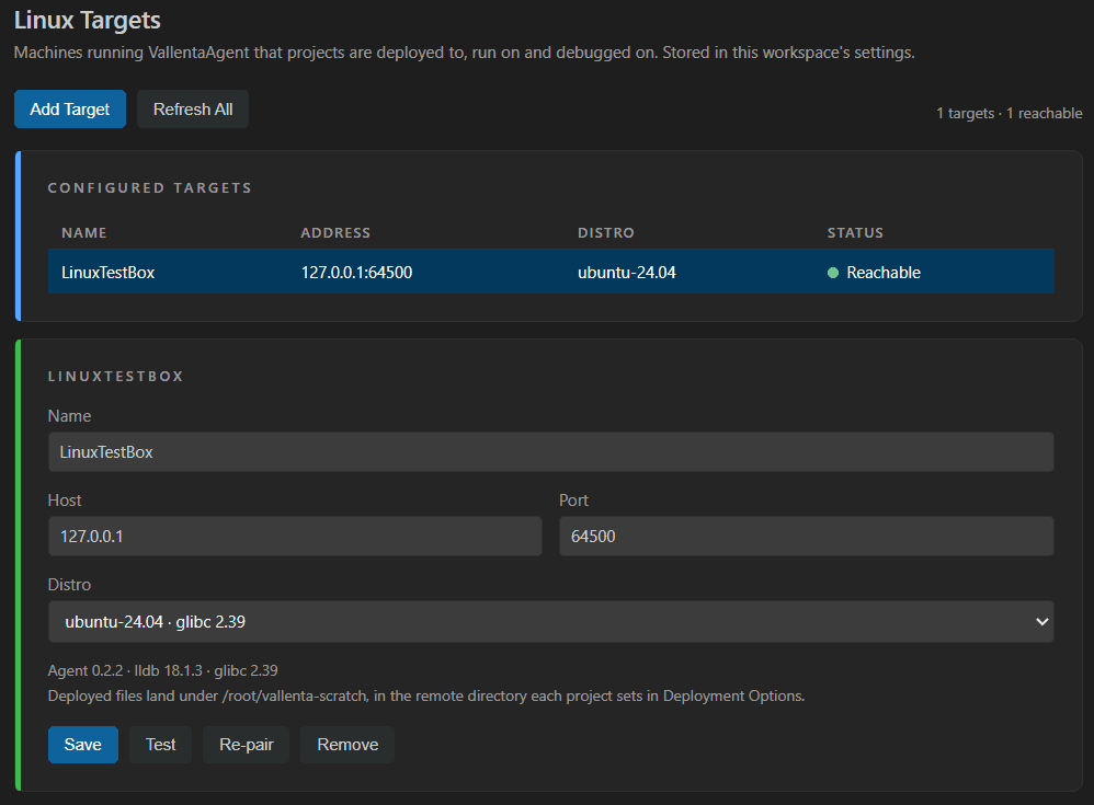 Vallenta Studio Linux Targets panel: one configured target with address, distribution and Reachable status, and its editor showing name, host, port, distribution, the reported agent, lldb and glibc versions, and Save, Test, Re-pair and Remove buttons.